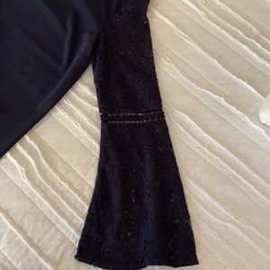 Loft Navy dress with lace bell sleeves.